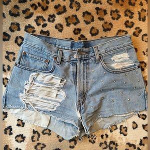 Custom Levi Denim shorts and bezeled rhinestones on left leg!